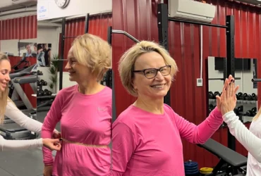 Trener wykonuje pomiary obwodów taśmą w studio Body Movement Mokotów